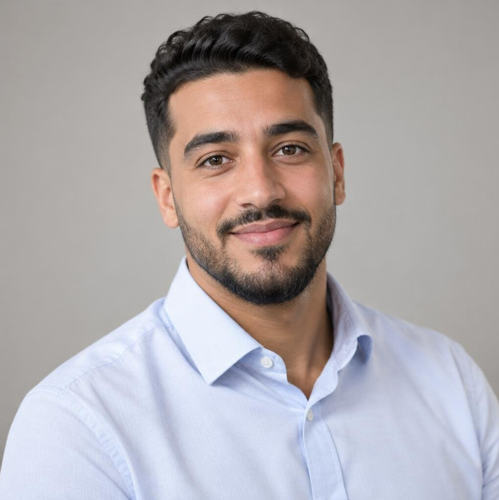 Young man with glasses production director portrait